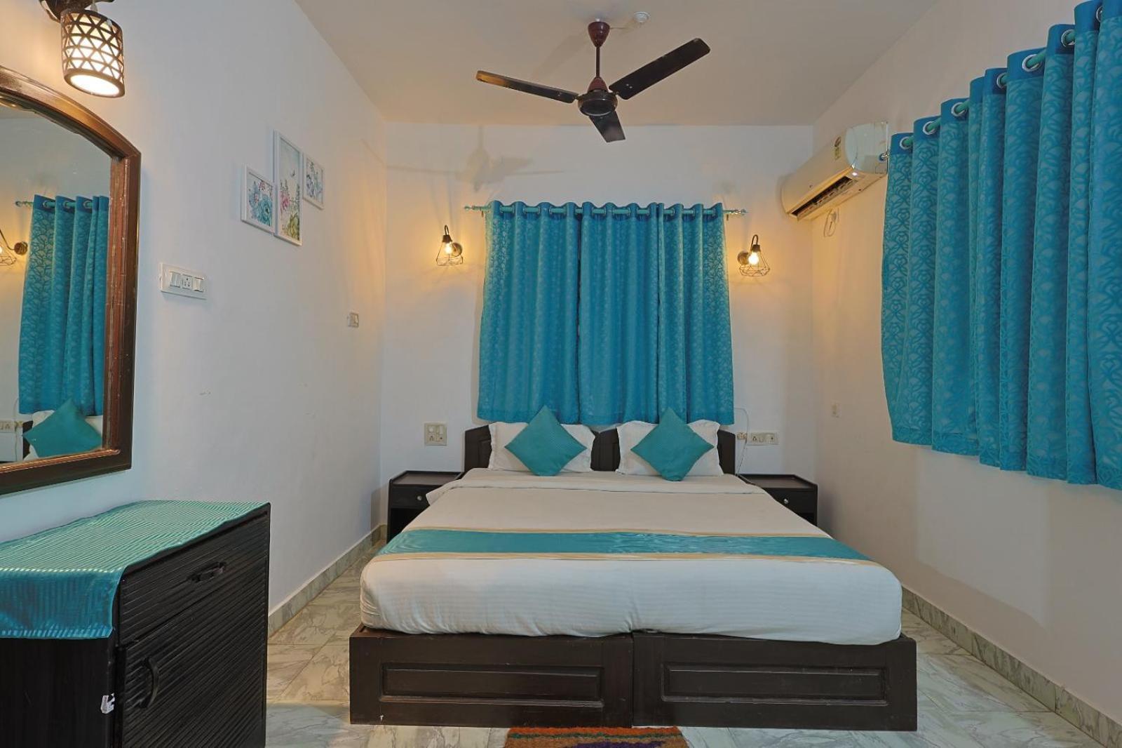 Baga Fantacia Beach Inn กาลังกูติ ห้อง รูปภาพ
