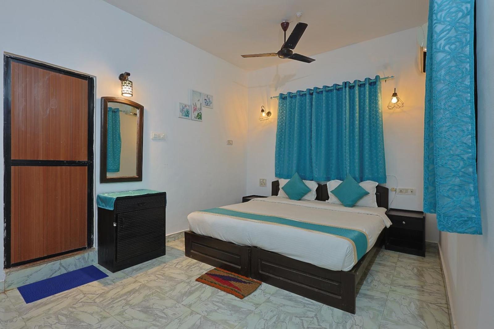 Baga Fantacia Beach Inn กาลังกูติ ห้อง รูปภาพ