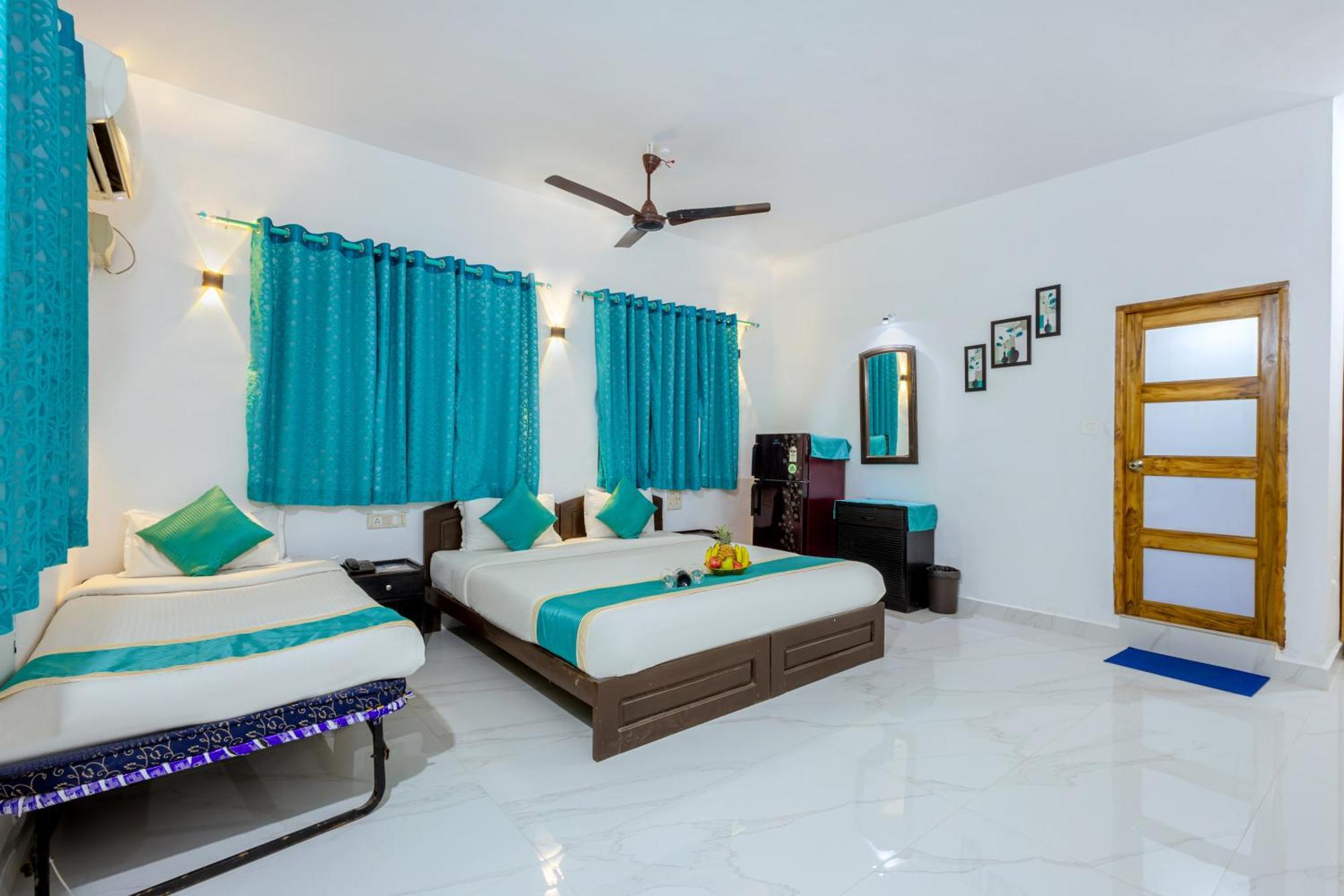 Baga Fantacia Beach Inn กาลังกูติ ห้อง รูปภาพ